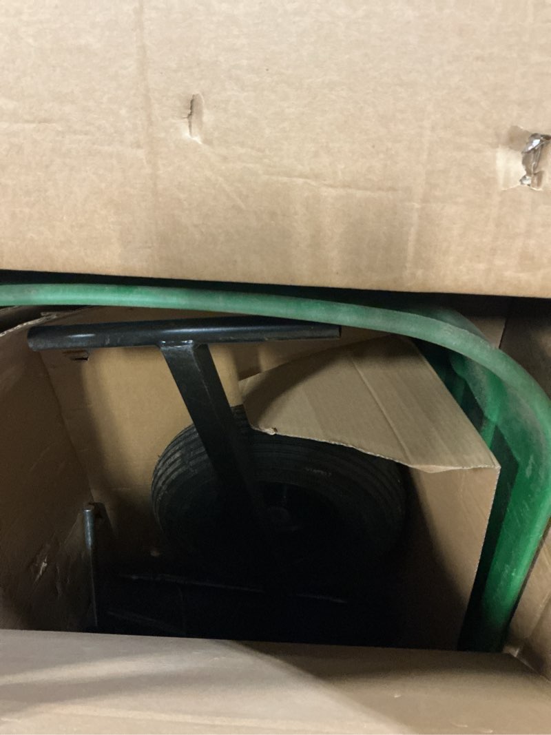 Condition photo showing As Is for tow barrow dumping lawn and garden utility trailer, 6.5 cubic foot