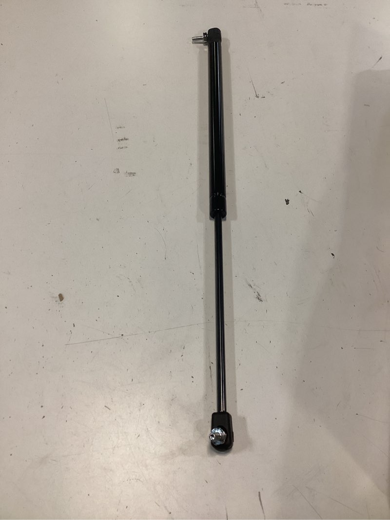 Condition photo showing New/Like New for gas-charged lift support strut 2pc