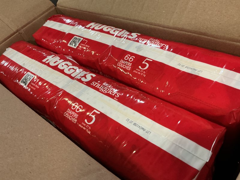 Condition photo showing New/Like New for huggies size 5 diapers, little snugglers baby diapers, size 5 (27+ lbs), 132 count (2 packs of 66), packaging may vary size 5 132