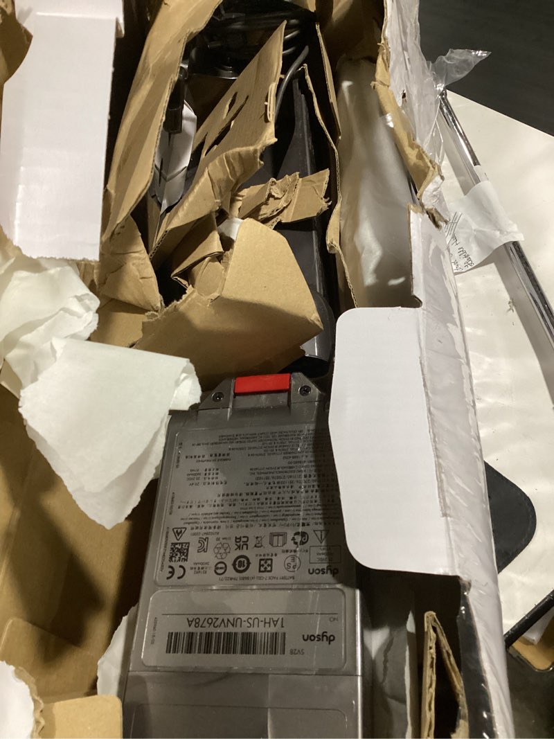 Condition photo showing As Is for dyson v11 cordless stick vacuum