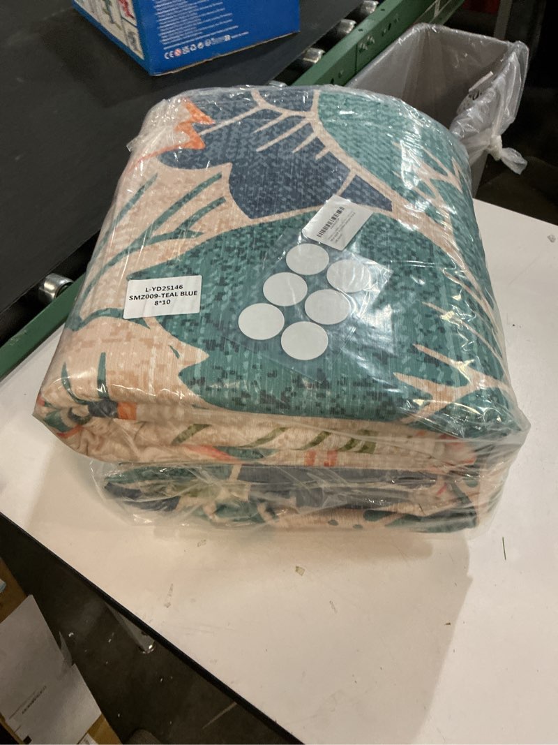 Condition photo showing New/Like New for genimo indoor outdoor area rug 8'x10', machine washable rugs for patio, waterproof, non-slip easy cleaning floral outdoor mat carpet for living room, bedroom, rv, balcony, deck, camping, teal blue teal blue 8' x 10' (rectangular)
