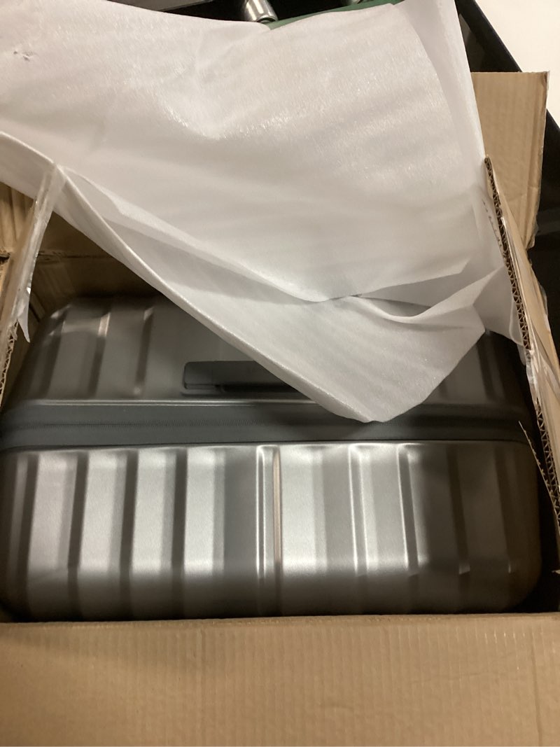 Condition photo showing Good Condition for Samsonite UpLIFT X-Large Checked Hardside Luggage with Spinner Wheels - Airline-Approved, TSA Lock, Adjustable Handle System - Polycarbonate Hard Suitcase for Ultra Lightweight Travel - Silver Shimmer X-Large Checked Silver Shimmer