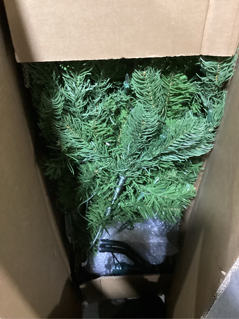 Condition photo showing As Is for National Tree Company 4.5 ft Pre-Lit Downswept Douglas Fir Artificial Christmas Tree, 450 Clear Lights, 525 Tips, Includes Stand, Green 4ft 6in Christmas Tree