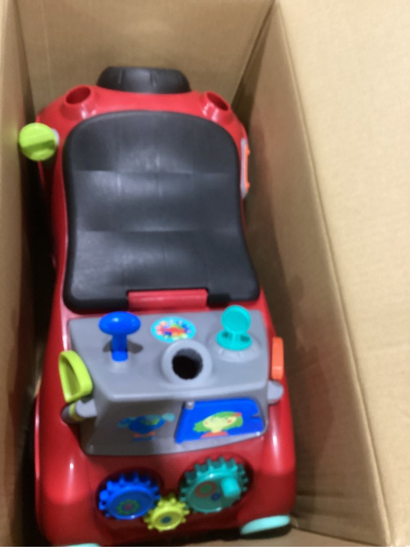 Condition photo showing Good Condition for Radio Flyer Busy Buggy, for Toddlers 1-3, 3-in-1 Push Walker Ride On Car with 17 Sensory Activities, Anti-Tip Feature, Under-Seat Storage, Horn and Gears, 42 lb Capacity, Toddler Ride On Toys Red