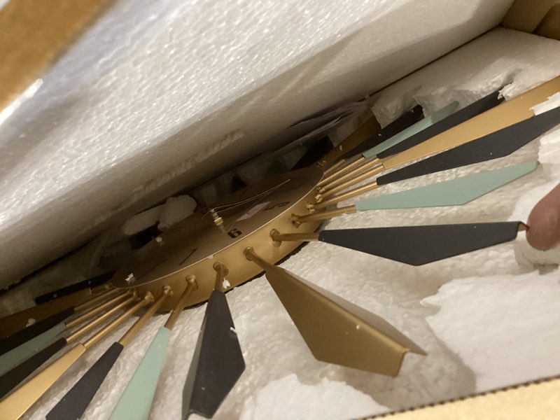 Condition photo showing Good Condition for YISITEONE Large Wall Clock Metal Decorative, Mid Century Silent Non-Ticking Big Clocks, Modern Home Decorations for Living Room,Bedroom,Dining Room, Office, 22 inch Medium 1.modern