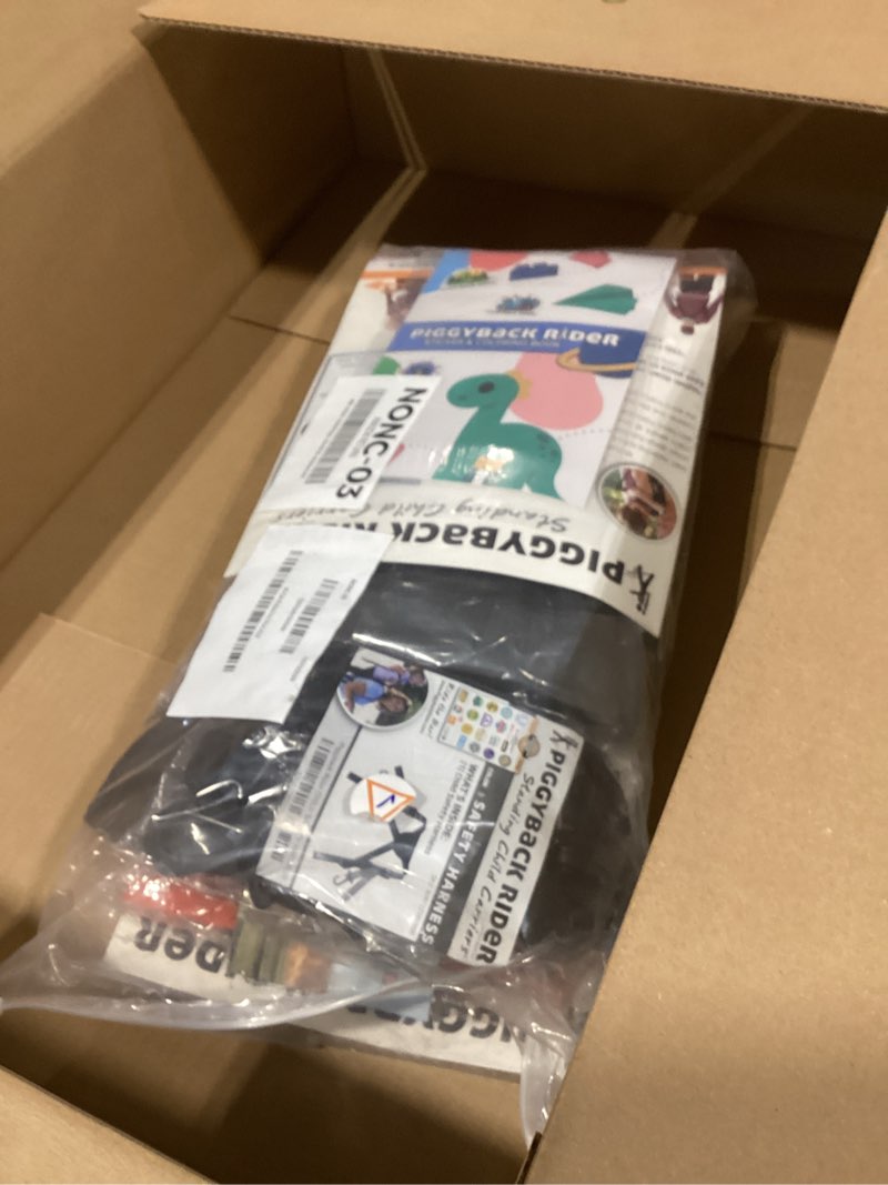 Condition photo showing Good Condition for Piggyback SCOUT Toddler Carrier Backpack Deluxe with 6-Piece Accessory Set: Hip Belt, Carry Bag, Side Pocket, Mud Flap, Water Bottle & More - For Ages 2-4 (Under 50 lbs) - Hiking & Travel Scout W/ 6 Piece Accessory Bundle (Orange)