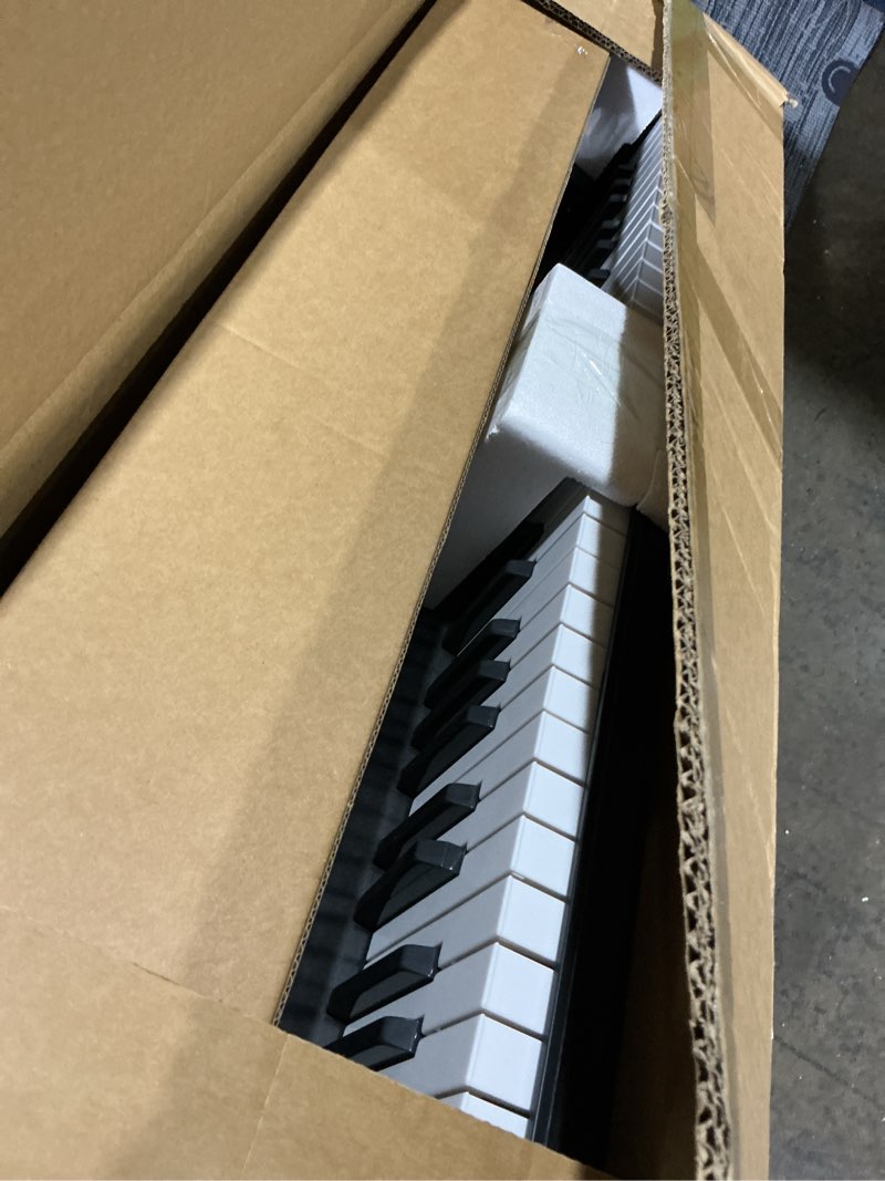 Condition photo showing Good Condition for 61 key portable electronic keyboard piano w/lighted full size keys, lcd, headphones, x-stand, stool, music rest, microphone, note stickers, built-in speakers,3 teaching modes