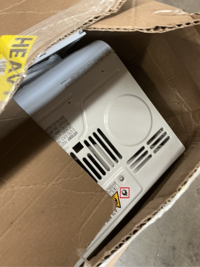Condition photo showing As Is for frigidaire 5,000 btu window-mounted air conditioner, cools up to 150 sq. ft., quiet operation, effortless temperature control, 2 fan speeds, auto restart, white 5,000 btu mechanical controls