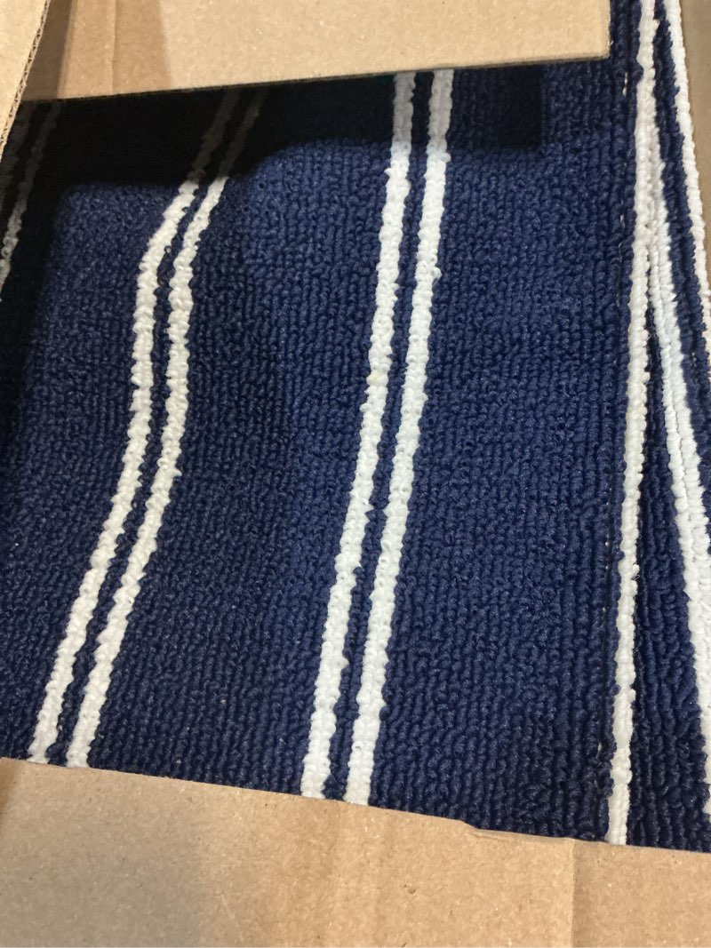 Condition photo showing Good Condition for garland rug avery striped navy blue / white 4 ft x 6 ft rug non-slip, soft, stain-resistant ideal for living rooms & hallways, stylish & durable for high-traffic areas navy 4' x 6' (rectangular)
