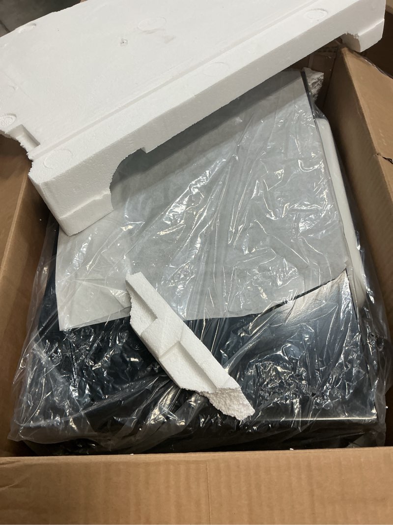 Condition photo showing As Is for Ginny's .9 Cu. ft. Metallic Microwave, Black