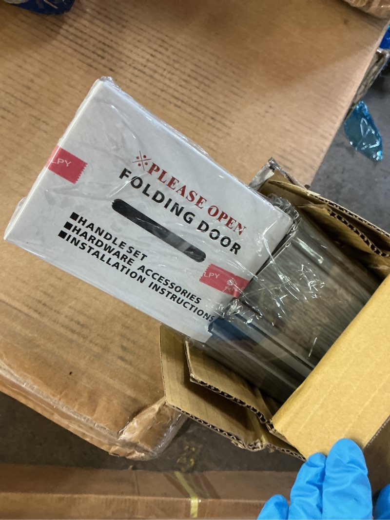 Condition photo showing As Is for Studio Series 48" W PVC Foldable Accordion Doors, Grey Gray 48