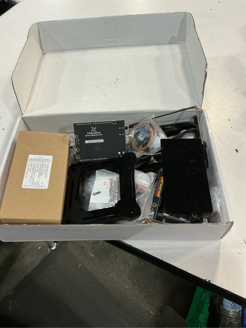 Condition photo showing Good Condition for freenove quadruped robot kit with remote (compatible with arduino ide), walking crawling twisting, app remote control, servo stem project