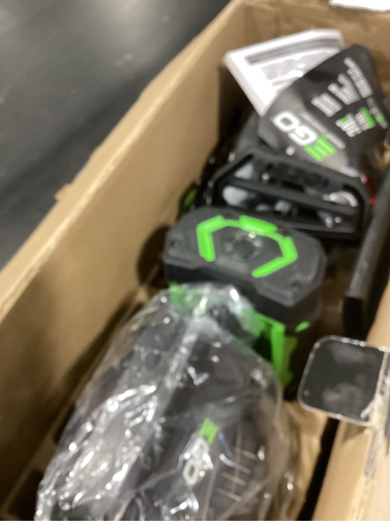 Condition photo showing New/Like New for ego power+ chain saw, 12" battery powered chainsaw, electric cordless, includes 56v 2.5ah battery and charger - cs1201 12" w/2.5ah battery