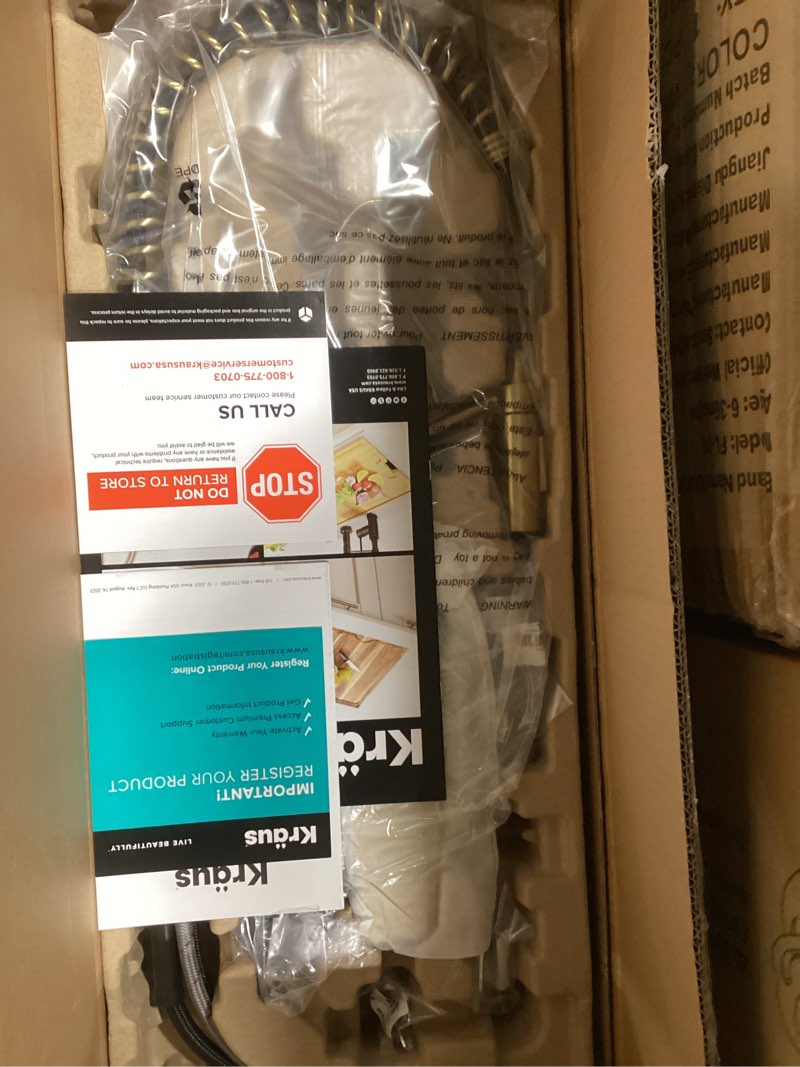 Condition photo showing New/Like New for KRAUS Oletto Commercial Style Single Handle Pull Down Kitchen Faucet with QuickDock Top Mount Installation Assembly in Brushed Brass, KPF-2631BB Brushed Brass Commercial Style Faucet