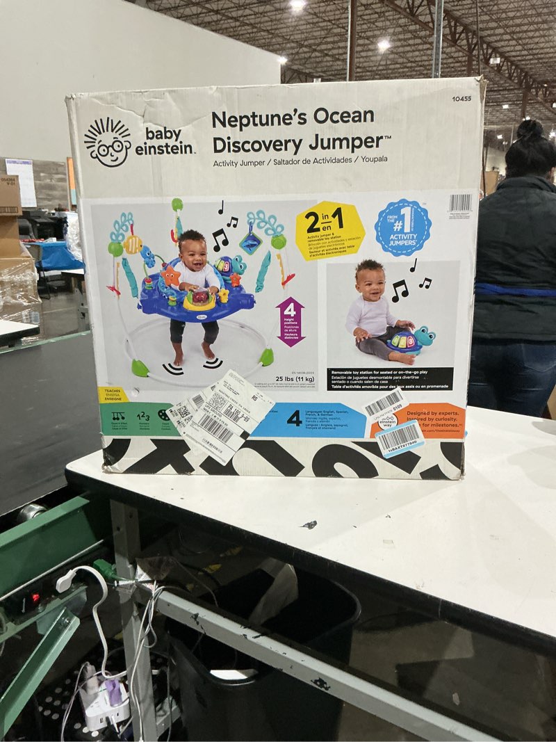 Condition photo showing New/Like New for baby einstein neptune's ocean discovery activity baby jumper activity center, ages 6 months +, max weight 25 lbs., unisex