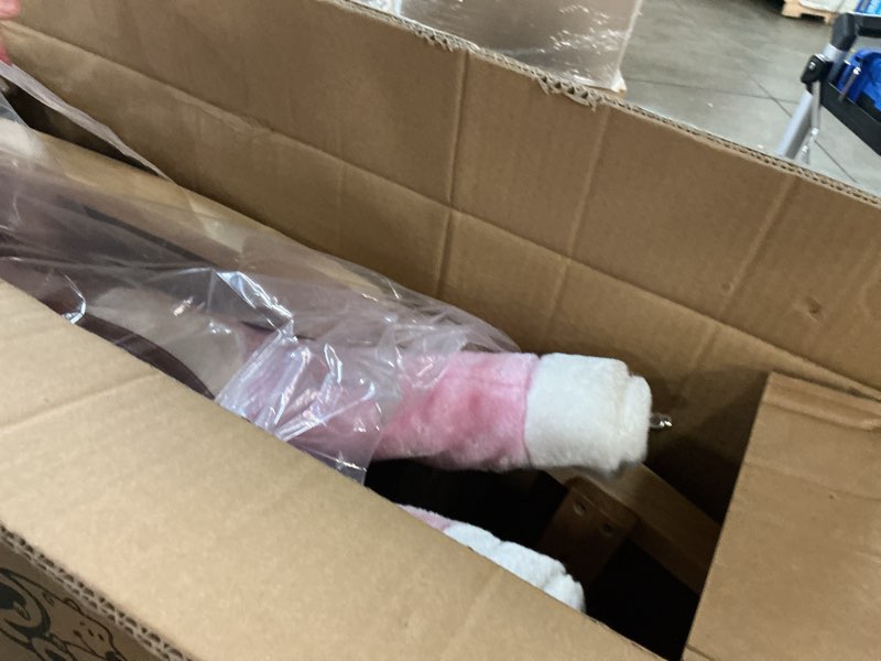 Condition photo showing New/Like New for kids kid on rocker horse pink