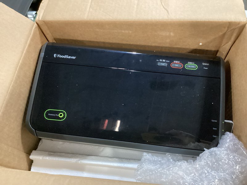 Condition photo showing New/Like New for FoodSaver Vacuum Sealer Machine, Automatic Bag Detection, Sous Vide Friendly, with sealer bags, roll, handheld vacuum sealer, black Vacuum Sealer + Accessories