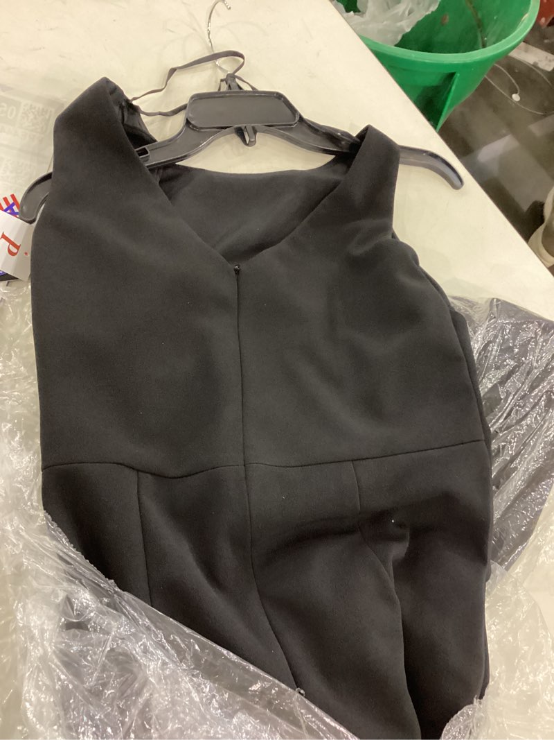 Condition photo showing New/Like New for Betsy & Adam Women's Long Sleeveless Boat Neck Ruffle Side Slit Scuba Crepe Gown 10 Petite Black