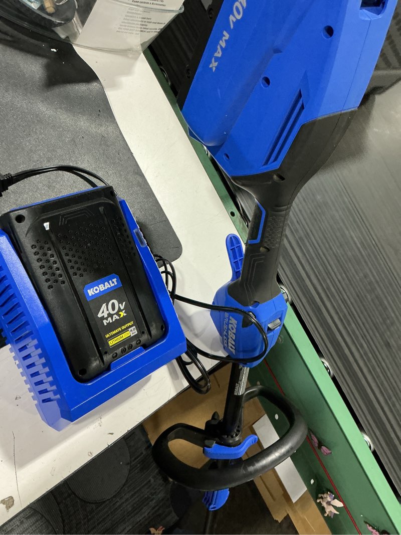 Condition photo showing As Is for kobalt 40-volt max 15-in straight cordless string trimmer
