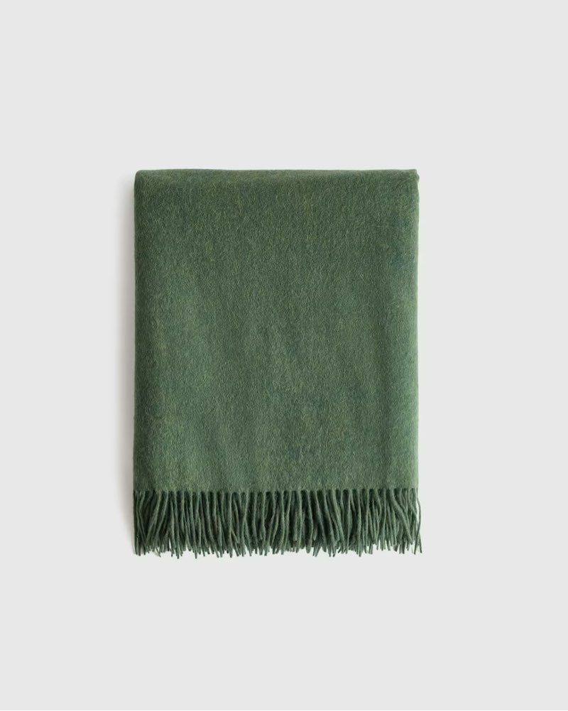 mongolian cashmere throw forest floor green 50x70