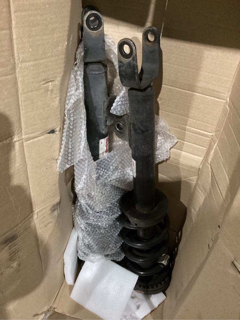 Condition photo showing As Is for strut assembly, 2pcs