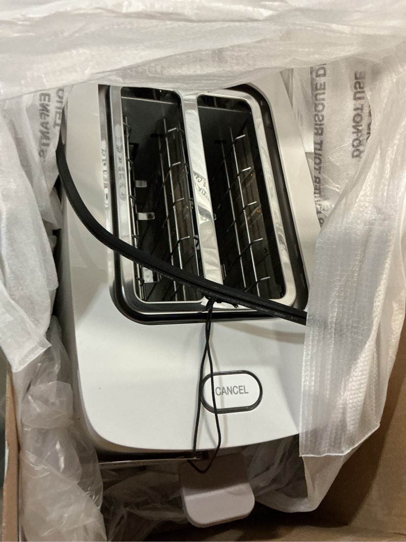Condition photo showing item condition for Cuisinart Soho™ Collection 2-Slice Toaster, 7 Toaster Setting, Defrost, Reheat, and Bagel Setting, Convenient Rear Cord Storage, Truffle, CPT-7TR 2-Slice Truffle