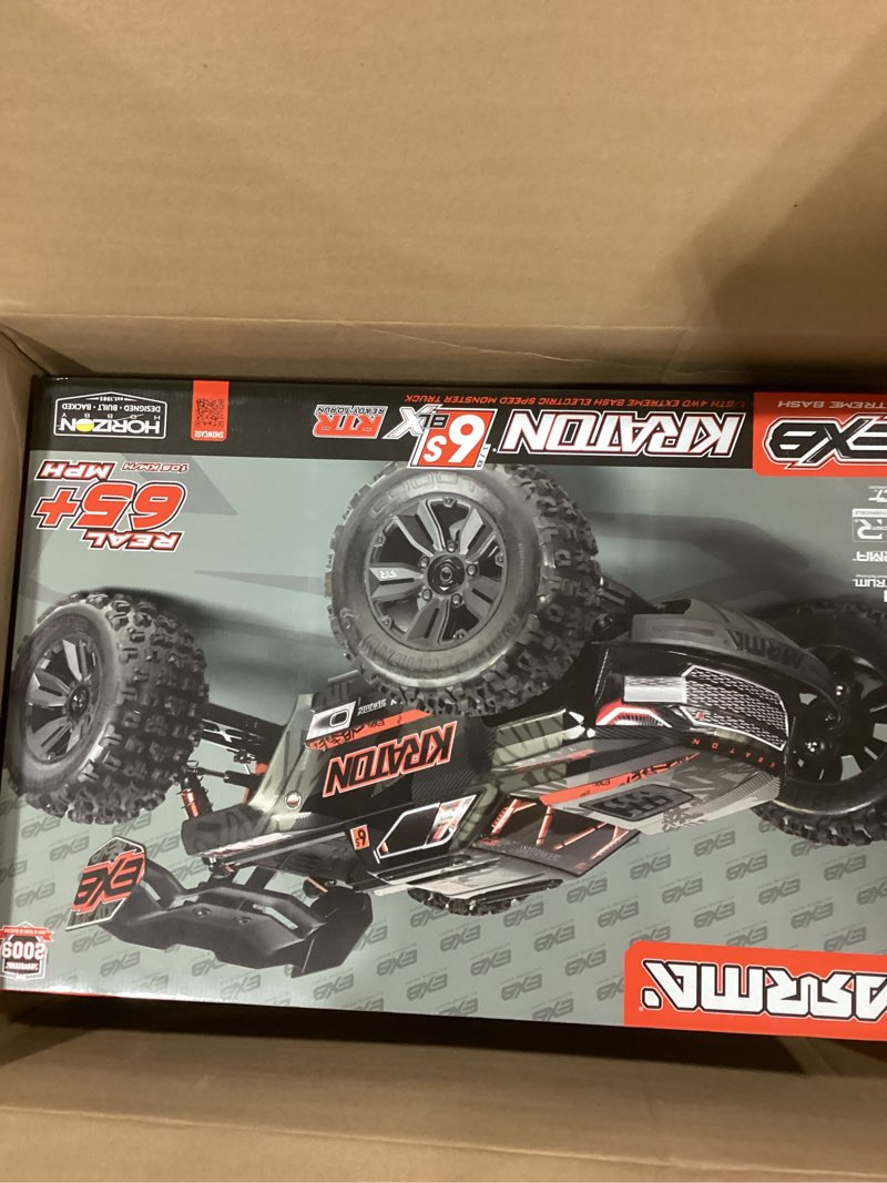 Condition photo showing As Is for ARRMA 1:8 Kraton 6S EXB Ready to Run, Clipless Body, Basher Monster Truck RC Remote Controlled, Powerful and Stable with Brushless Motor, Battery and Charger Not Included, Black, ARA8708V6T1 Black/Red