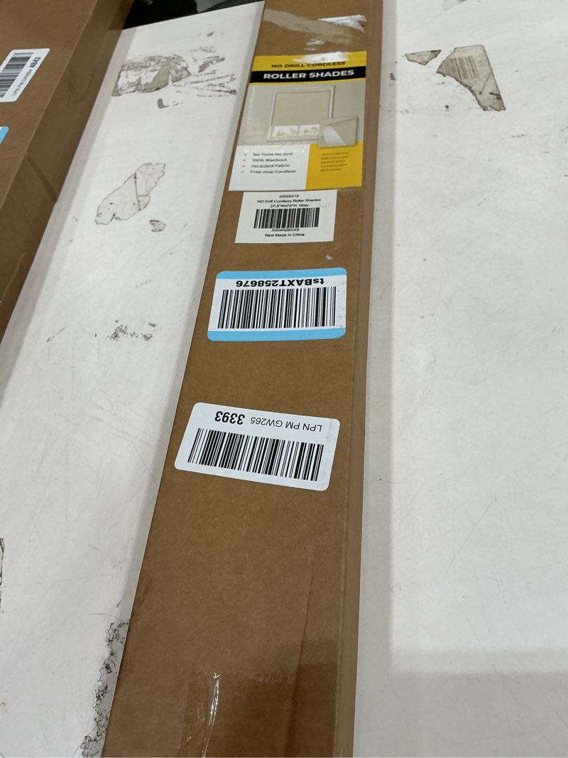Condition photo showing Good Condition for unishades no tools no drill cordless blackout roller shades for indoor windows, easy to install, darkens rooms, blocks heat, and protects against uv rays, window size 27.5” w × 72" h grey blackout - grey 27.5" w × 72" h