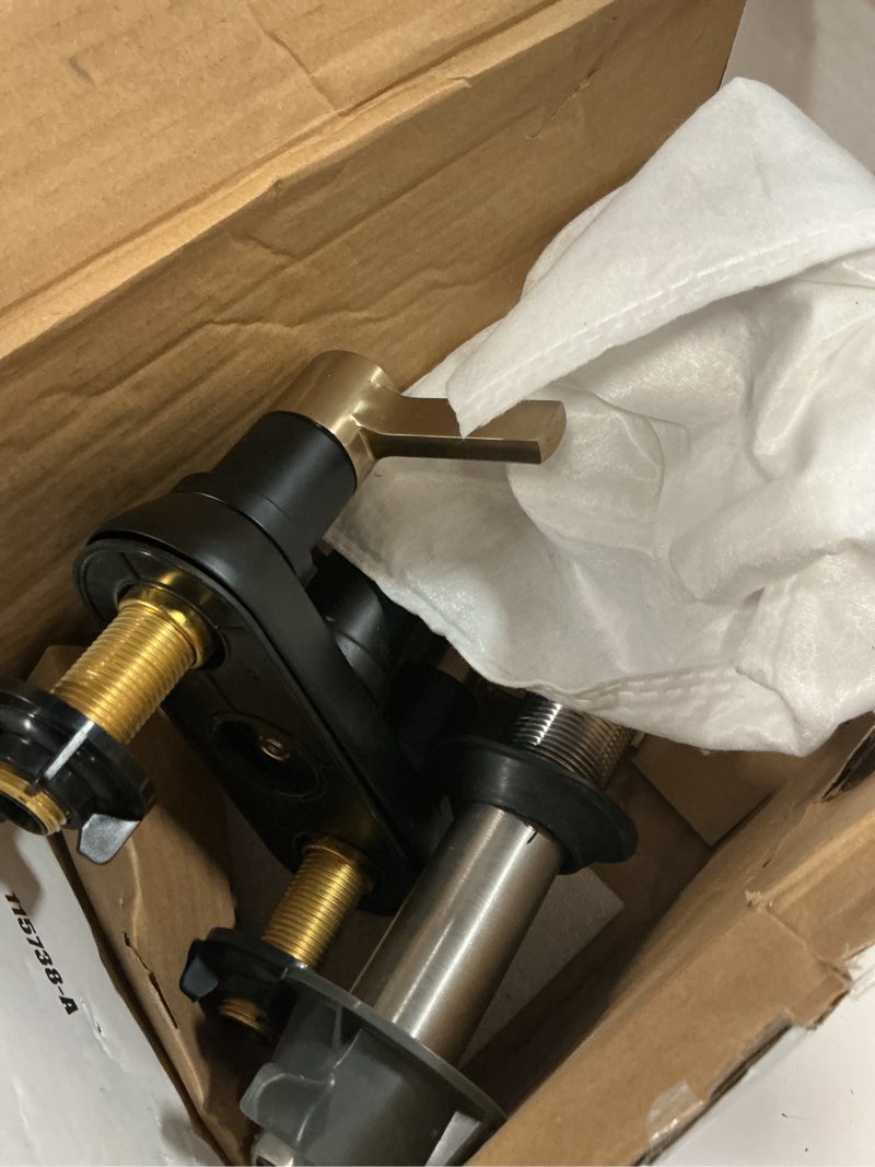 Condition photo showing As Is for delta albion centerset matte black/brushed gold bathroom faucet, 4 inch 3 hole bathroom sink faucet for vanity, metal push-pop drain assembly, matte black/champagne bronze 25855lf-gz matte black champagne bronze