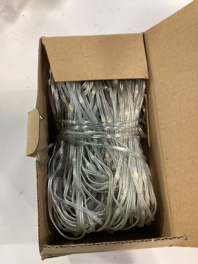 Condition photo showing New/Like New for brightown 600 led curtain string lights, 20 ft hanging fairy lights with remote, 8 modes, waterproof window lights for bedroom backdrop wedding outdoor christmas party, warm white warm white 600led