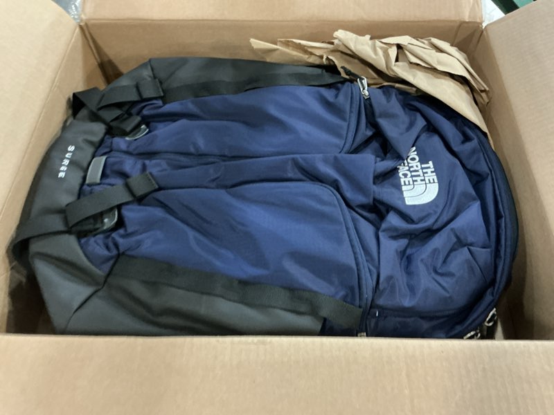 Condition photo showing Good Condition for the north face surge commuter laptop backpack | daypack with water repellent finish, 16" laptop sleeve, reflective details one size tnf navy/tnf black-npf