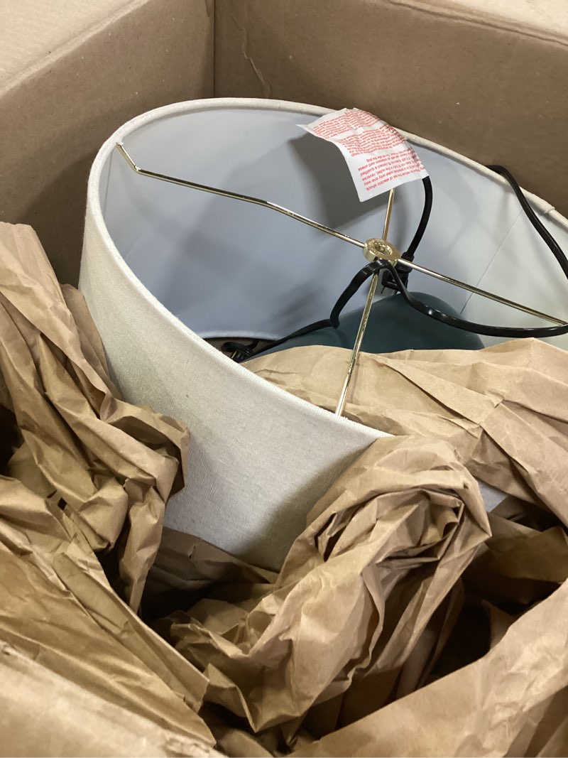 Condition photo showing Good Condition for signature design by ashley lemrich coastal 25.25" ceramic table lamp, 3-way switch, ul listed, fabric drum shade, use 100 watt lightbulb (not included), white and blue (teal) ombre effect