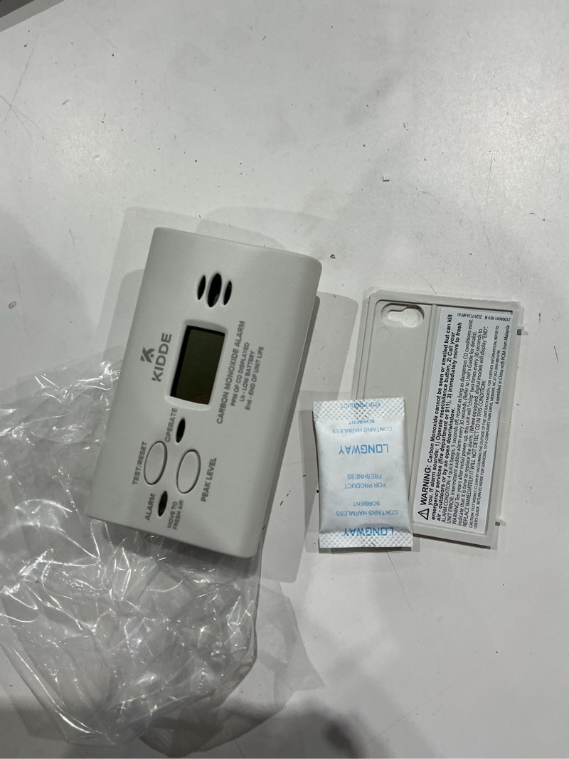 Condition photo showing As Is for kidde battery operated carbon monoxide alarm with digital display kn-copp-b-lpm