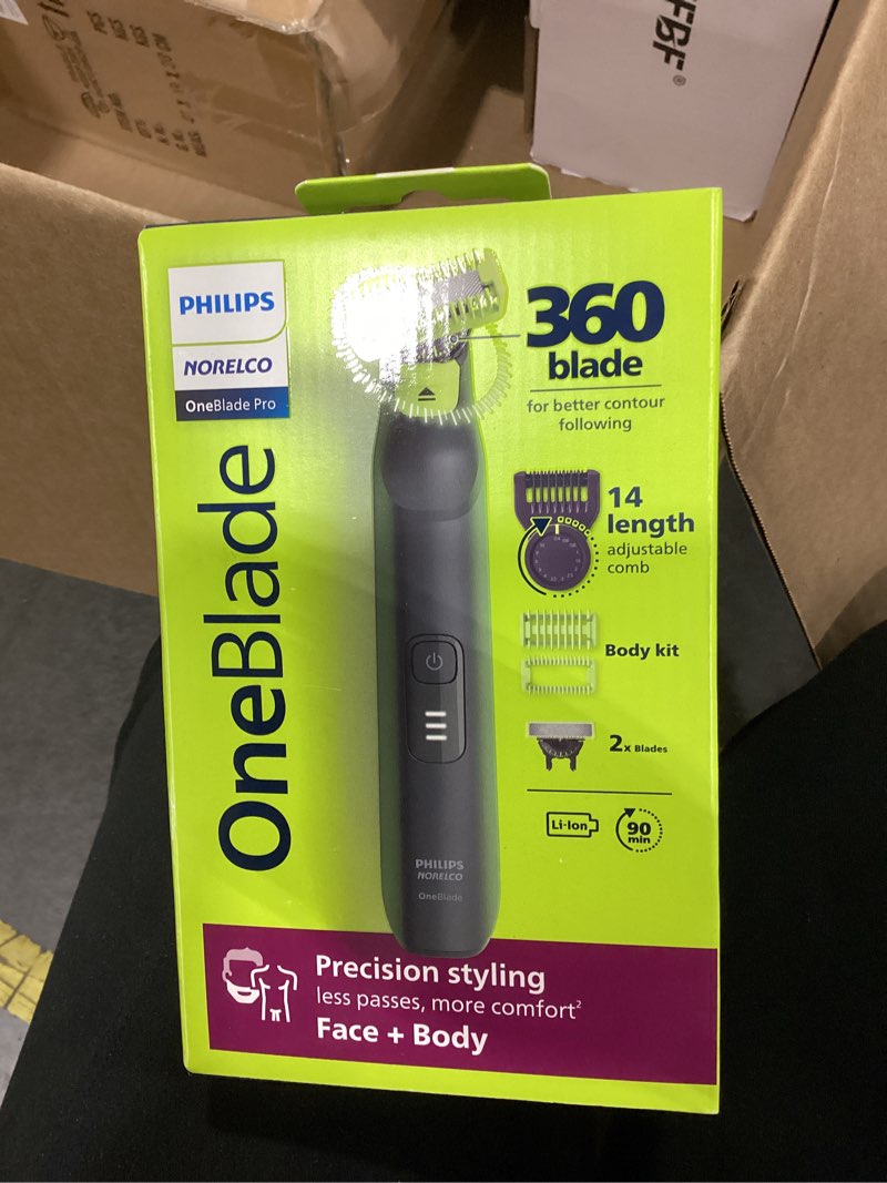 Condition photo showing New/Like New for philips norelco oneblade pro 360 face + body electric shaver, beard trimmer and groomer, with 360 blade technology, 14-length precision comb, body kit, soft pouch, model qp6542/70 oneblade pro 360 face+body - 5 piece set black/lime green