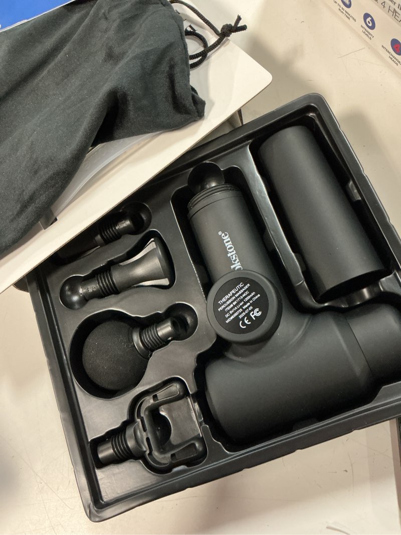 Condition photo showing As Is for brookstone deep tissue massage gun for pain relief & muscle recovery – 9-speed handheld percussion massager, 4 heads, type-c rechargeable, quiet, 3200 rpm, shockproof design