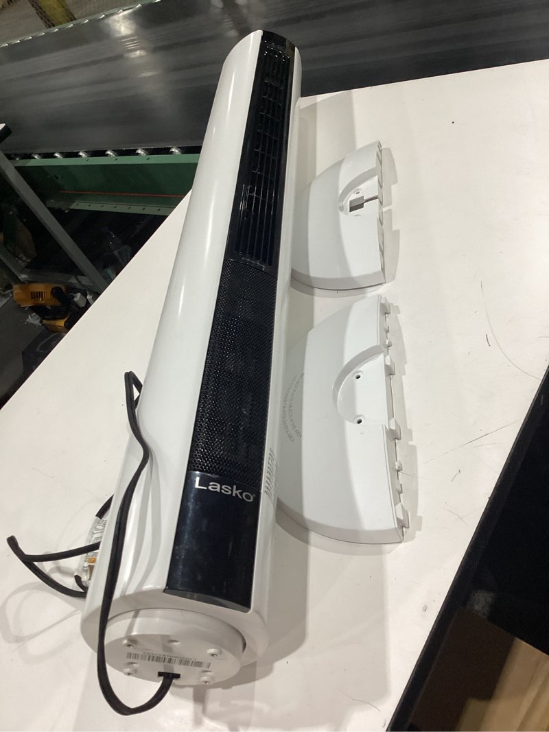 Condition photo showing As Is for **no remote** not tested**  lasko oscillating all season tower fan and space heater in one for home with adjustable thermostat, overheat protection, 4 fan speeds, 3 heat settings and remote, 42 inches, 1500w, white, fh500 black white