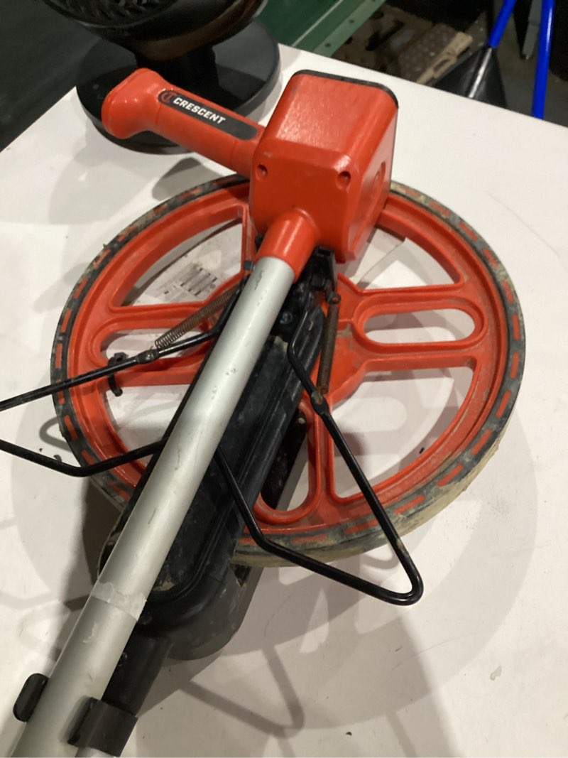 Condition photo showing As Is for crescent lufkin 12-in measuring wheel