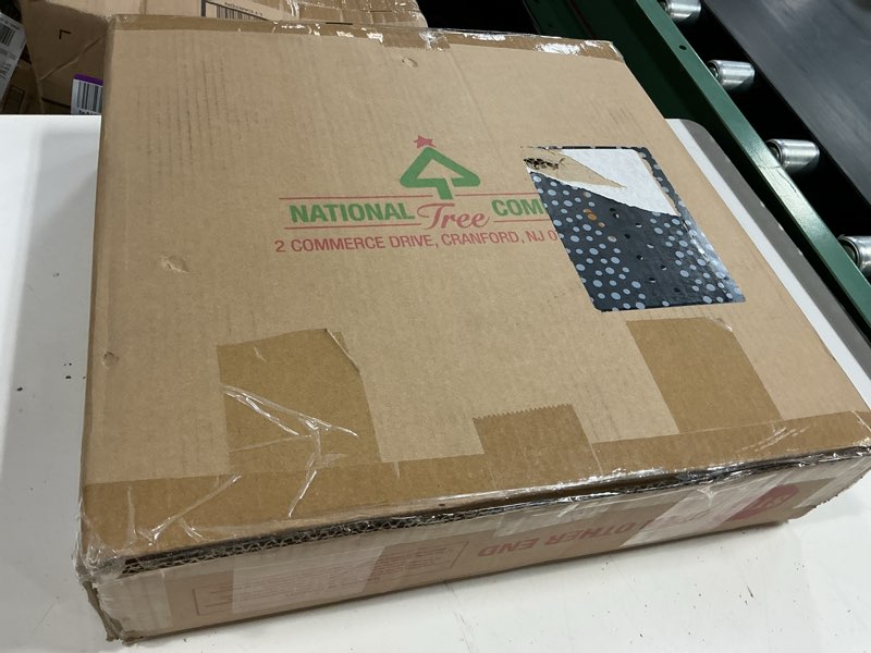 Condition photo showing New/Like New for national tree company 24 in pre-lit crestwood spruce artificial christmas wreath, christmas decoration with glitter, pinecones, red berries, 50 clear lights, 160 tips, green 24 in plug in wreath