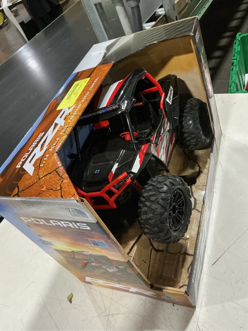 Condition photo showing As Is for polaris® rzr 1:14 scale radio control off-road vehicle, red, rechargeable usb battery
