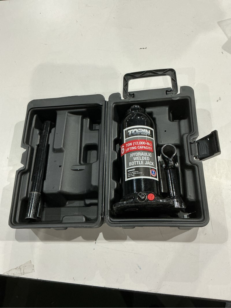 Condition photo showing As Is for torin black 6-ton steel hydraulic bottle jack