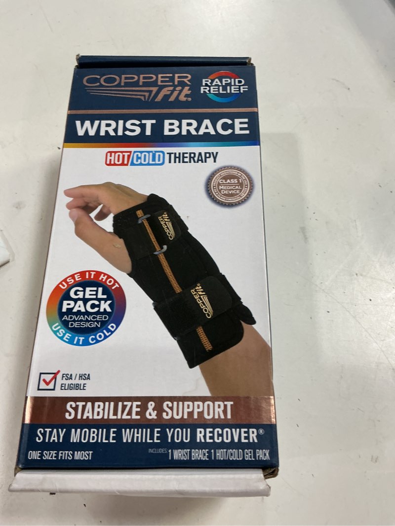 Condition photo showing New/Like New for copper fit unisex adult fingerless rapid relief adjustable wrist wrap with ice pack or heat therapy, black, adjustable