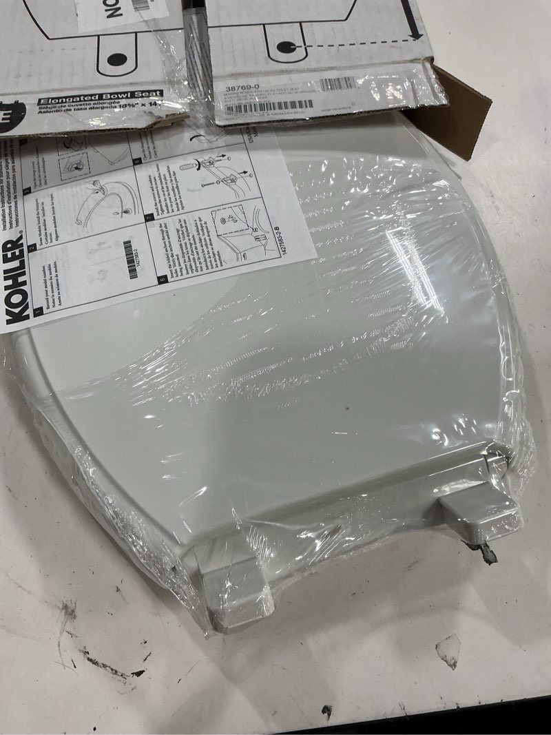Condition photo showing New/Like New for kohler 20110-96 brevia, slow close toilet seat, elongated toilet seat, grip-tight bumpers quick-attach hardware, biscuit biscuit elongated quiet-close