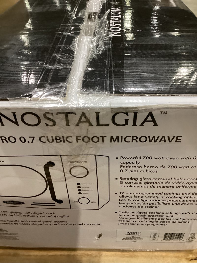 Condition photo showing As Is for Item similar)))))Nostalgia Retro 0.7 Cubic Foot 700 Watt Countertop Microwave Oven
