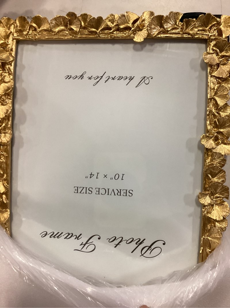 Condition photo showing Good Condition for Cuspin 11x14 Picture Frame Vintage Gold Frames, Ornate Leaf Textured Hand-Crafted Resin with Glass Front, Gold Picture Frames for Tabletop Display, Retro Design Home Decor Gold Ornate Leaf 11x14