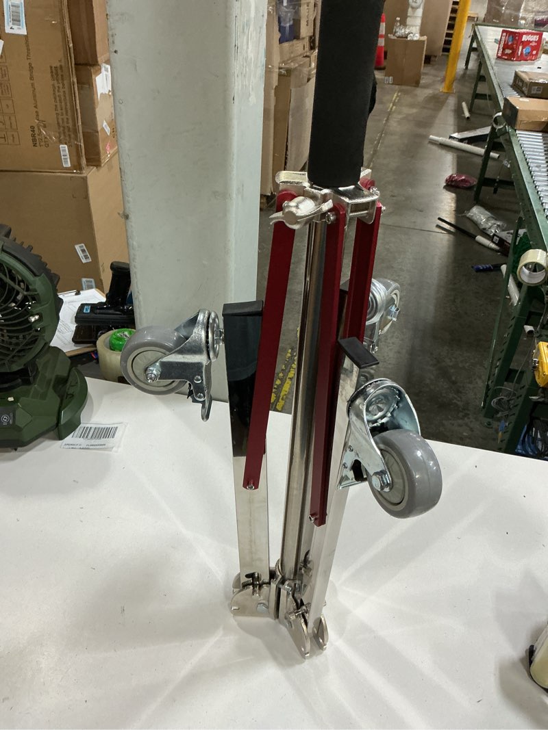 Condition photo showing Good Condition for heavy-duty portable light stand on caster wheels (similar to stock photo)