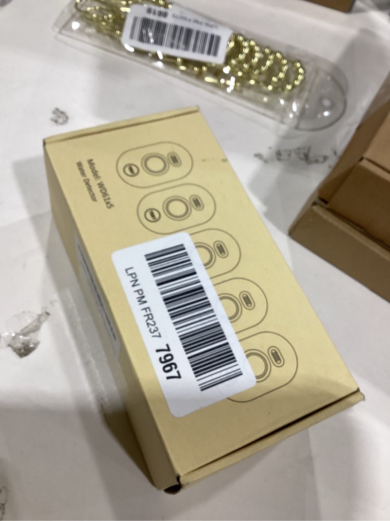 Condition photo showing As Is for 5 Pack Water Leak Detectors for Home, 100dB Water Sensor Alarm for Basement,Flood Leakage Detection Devices for Pipe/Drain/Sink/Faucet Drip Alert,Floor Flooding in Bathroom/Kitchen/Toilet/Laundry Room 5 Sensors White