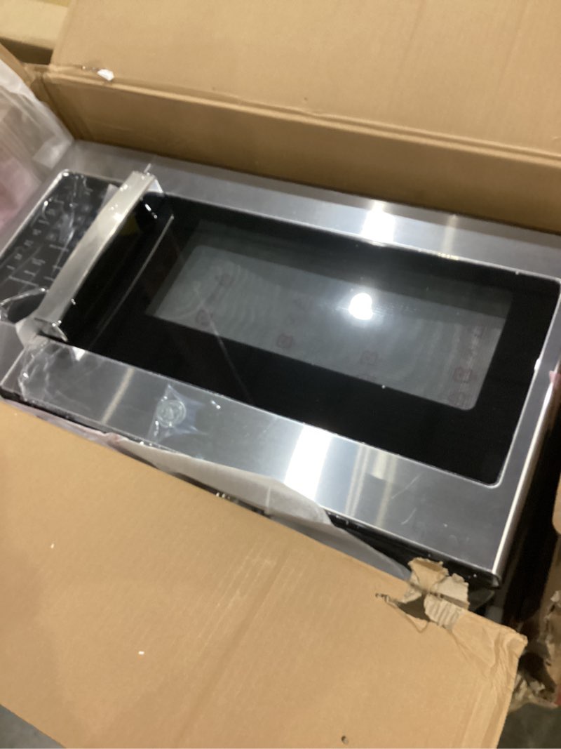 Condition photo showing As Is for ge jvm3160rfss 30" otr microwave, 1.6 cu ft, 1000w, 300 cfm hood vent, led lighting, auto defrost, easy mount install, stainless steel