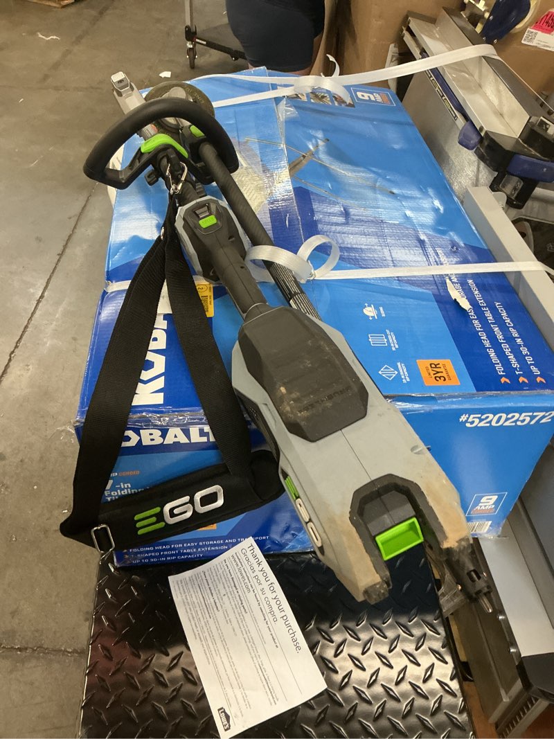 Condition photo showing As Is for (incomplete)ego power+ st1623t 56-volt 16-inch cordless string trimmer, 4.0ah battery, 320w charger included plus extra ba1400t 2.5ah battery