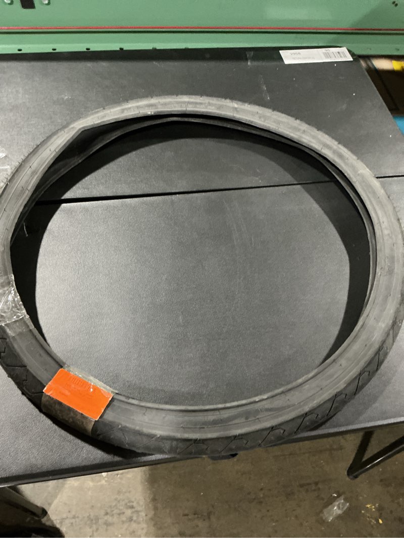 Condition photo showing Good Condition for sunlite city slick tires, black/black 26" x 1.95"