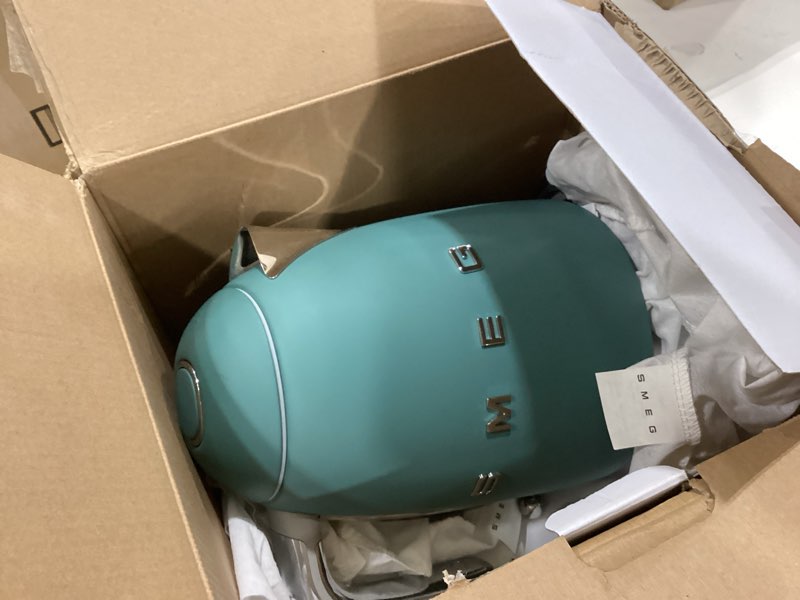 Condition photo showing As Is for smeg klf03 7 cup electric water kettle, retro-style, soft-opening lid, auto shut-off, 360° swivel base – jade 1.8 quarts jade